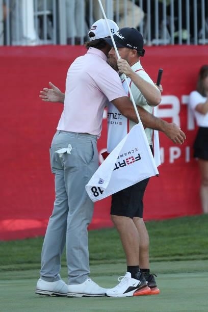 Max Homa hugs his caddie following the final round of the Fortinet Championship at Silverado Resort and Spa on September 19, 2021 in Napa, California.