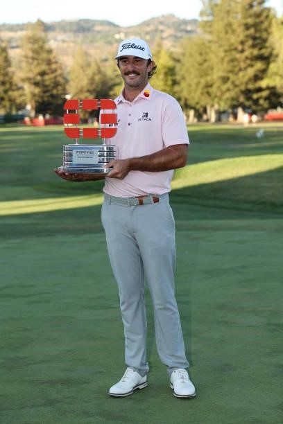 Max Homa celebrates with the champion's trophy after winning the Fortinet Championship at Silverado Resort and Spa on September 19, 2021 in Napa,...