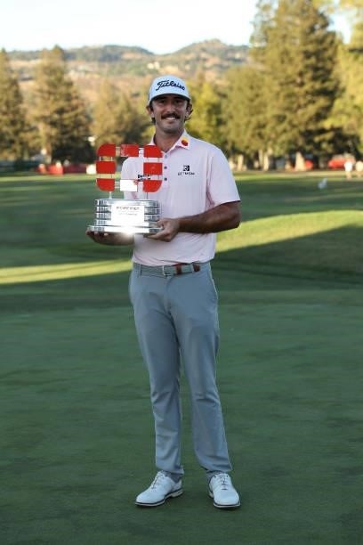 Max Homa celebrates with the champion's trophy after winning the Fortinet Championship at Silverado Resort and Spa on September 19, 2021 in Napa,...