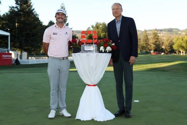Max Homa poses with Fortinet Founder And CEO Ken Xie following his win of the Fortinet Championship at Silverado Resort and Spa on September 19, 2021...
