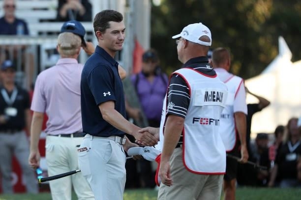Maverick McNealy shakes hands with his caddie following the final round of the Fortinet Championship at Silverado Resort and Spa on September 19,...