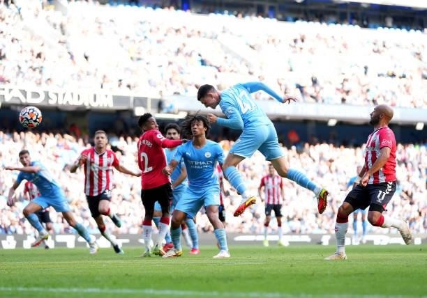 Phil Foden of Manchester City fires a header at goal during the Premier League match between Manchester City and Southampton at Etihad Stadium on...