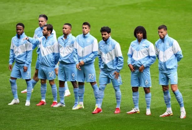 Manchester City players line up in warm up jackets during the Premier League match between Manchester City and Southampton at Etihad Stadium on...