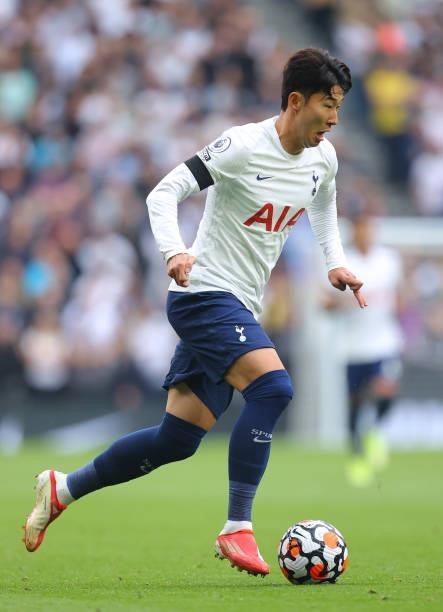 Son Heung-min of Tottenham Hotspur runs with the ball during the Premier League match between Tottenham Hotspur and Chelsea at Tottenham Hotspur...