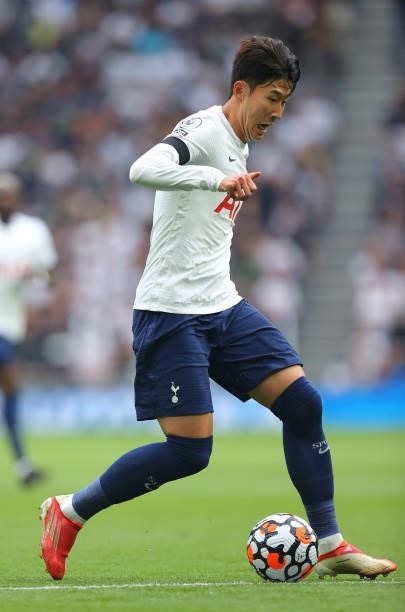 Son Heung-min of Tottenham Hotspur runs with the ball during the Premier League match between Tottenham Hotspur and Chelsea at Tottenham Hotspur...