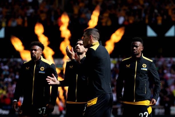 Conor Coady of Wolverhampton Wanderers gives his team instructions ahead of the Premier League match between Wolverhampton Wanderers and Brentford at...