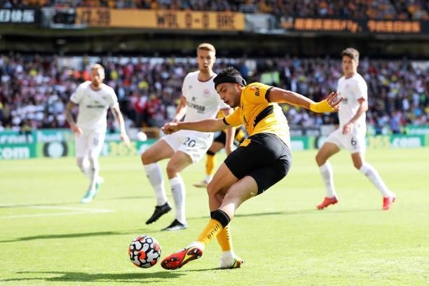 Raul Jimenez of Wolverhampton Wanderers crosses the ball during the Premier League match between Wolverhampton Wanderers and Brentford at Molineux on...