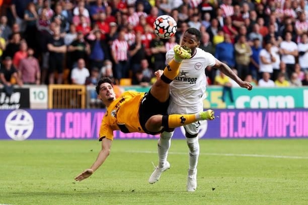 Francisco Trincao of Wolverhampton Wanderers attempts a kick during the Premier League match between Wolverhampton Wanderers and Brentford at...
