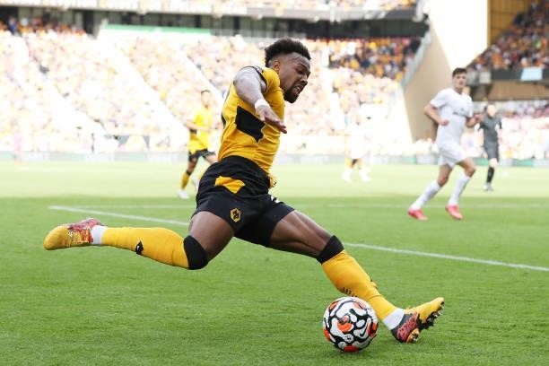 Adama Traore of Wolverhampton Wanderers crosses the ball during the Premier League match between Wolverhampton Wanderers and Brentford at Molineux on...
