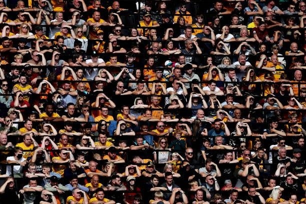 Wolverhampton Wanderers fans are seen during the Premier League match between Wolverhampton Wanderers and Brentford at Molineux on September 18, 2021...