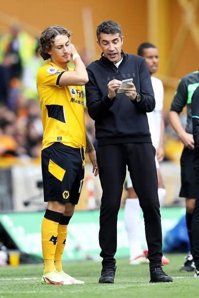 Bruno Lage, Manager of Wolverhampton Wanderers speaks with Fabio Silva of Wolverhampton Wanderers during the Premier League match between...