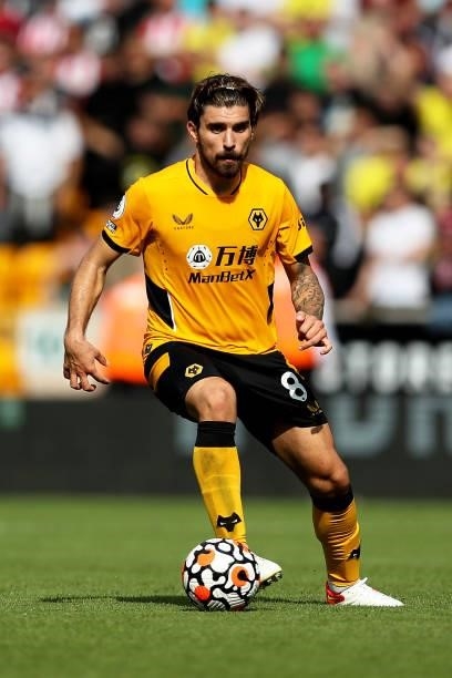 Ruben Neves of Wolverhampton Wanderers runs with the ball during the Premier League match between Wolverhampton Wanderers and Brentford at Molineux...