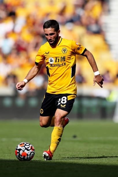 Joao Moutinho of Wolverhampton Wanderers runs with the ball during the Premier League match between Wolverhampton Wanderers and Brentford at Molineux...
