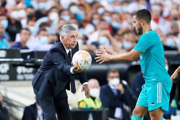 Carlo Ancelotti of Real Madrid gives the ball to Eden Hazard of Real Madrid during the La Liga Santander match between Valencia CF and Real Madrid CF...
