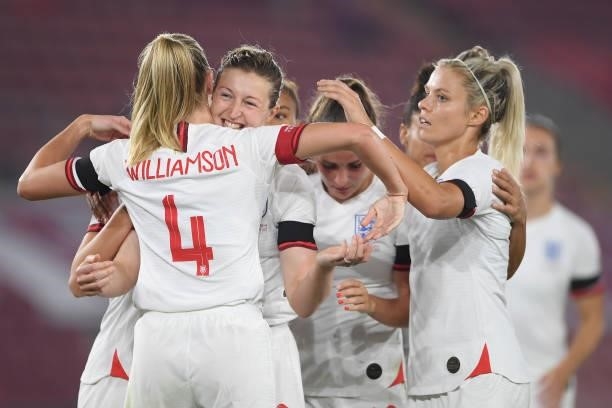Ellen White of England celebrates with teammate Leah Williamson after scoring their side's fourth goal from the penalty spot during the FIFA Women's...