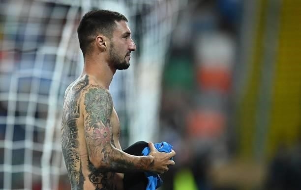 Matteo Politano of SSC Napoli celebrates the victory during the Serie A match between Udinese Calcio and SSC Napoli at Dacia Arena on September 20,...