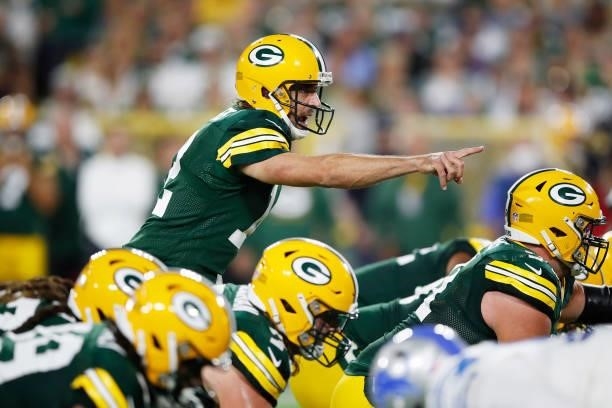 Aaron Rodgers of the Green Bay Packers signals against the Detroit Lions during the first half at Lambeau Field on September 20, 2021 in Green Bay,...
