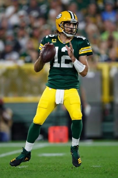 Aaron Rodgers of the Green Bay Packers passes against the Detroit Lions during the first half at Lambeau Field on September 20, 2021 in Green Bay,...
