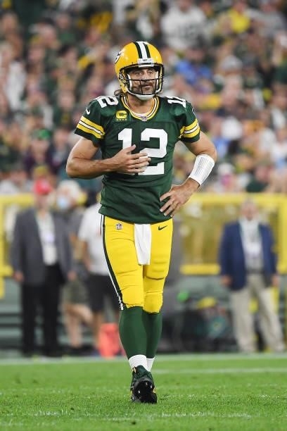 Aaron Rodgers of the Green Bay Packers reacts against the Detroit Lions during the first half at Lambeau Field on September 20, 2021 in Green Bay,...