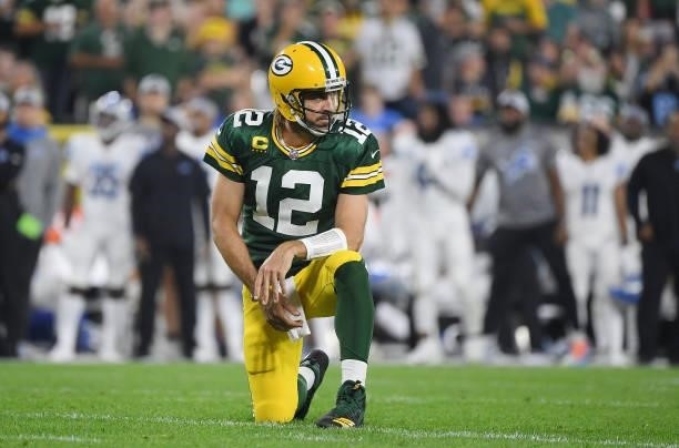 Aaron Rodgers of the Green Bay Packers reacts against the Detroit Lions during the first half at Lambeau Field on September 20, 2021 in Green Bay,...