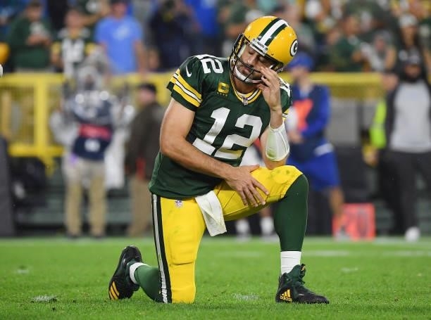 Aaron Rodgers of the Green Bay Packers reacts against the Detroit Lions during the second half at Lambeau Field on September 20, 2021 in Green Bay,...
