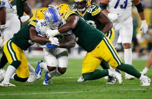 Andre Swift of the Detroit Lions runs against the Green Bay Packers during the second half at Lambeau Field on September 20, 2021 in Green Bay,...