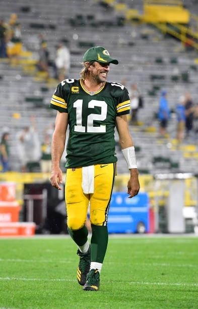 Aaron Rodgers of the Green Bay Packers reacts as he walks of the field following the team's win against the Detroit Lions during an NFL football game...