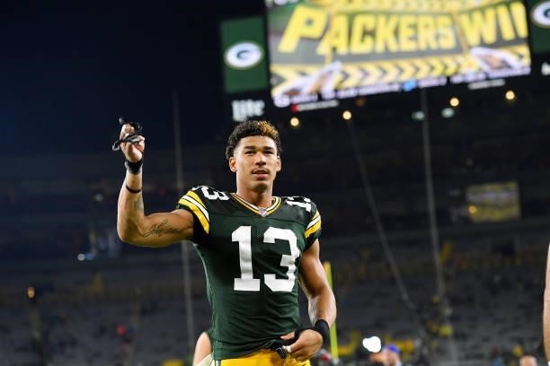 Allen Lazard of the Green Bay Packers reacts as he walks of the field following the team's win against the Detroit Lions during an NFL football game...