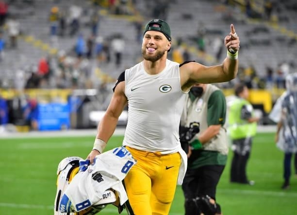 Robert Tonyan of the Green Bay Packers reacts as he walks of the field following the team's win against the Detroit Lions during an NFL football game...