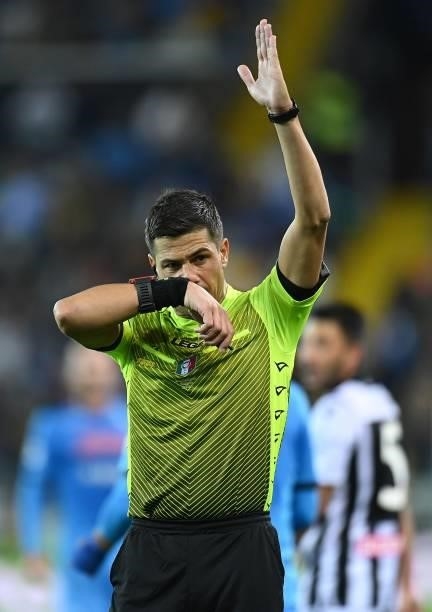 Referee Gianluca Manganiello gestures during the Serie A match between Udinese Calcio and SSC Napoli at Dacia Arena on September 20, 2021 in Udine,...