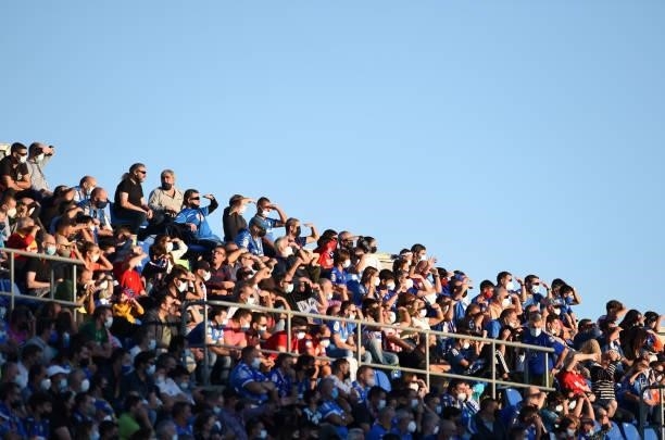 Spectators look on from inside of the stadium during the La Liga Santander match between Getafe CF and Club Atletico de Madrid at Coliseum Alfonso...