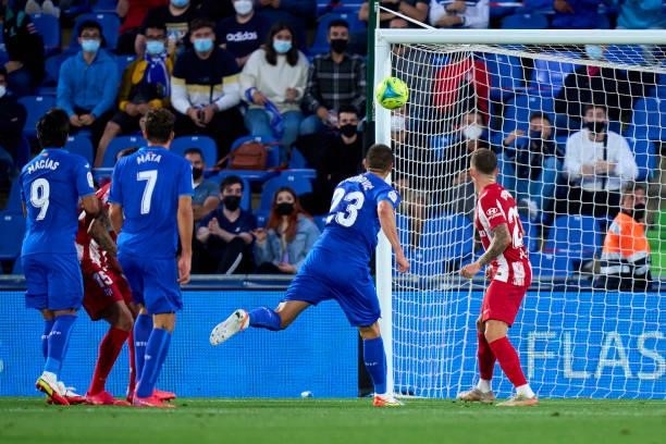 Stefan Mitrovic of Getafe scoring his team's first goal during the La Liga Santander match between Getafe CF and Club Atletico de Madrid at Coliseum...