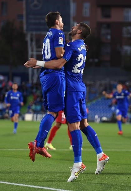 Stefan Mitrovic of Getafe celebrates after scoring their sides first goal with team mate Nemanja Maksimovic during the La Liga Santander match...