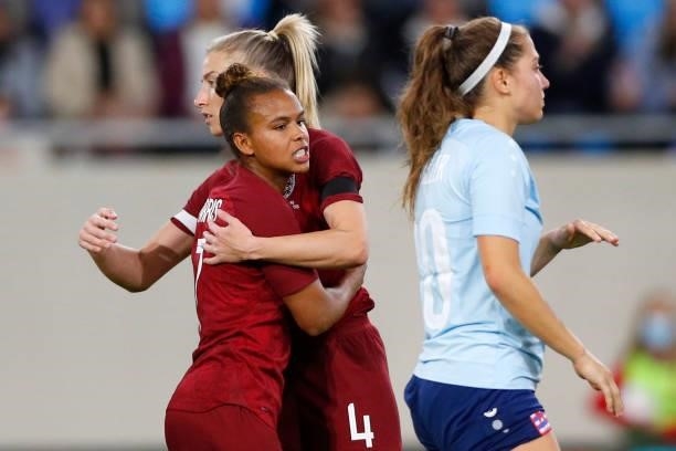 Nikita Parris of England celebrates with Leah Williamson after scoring their side's third goal during the FIFA Women's World Cup 2023 Qualifier group...