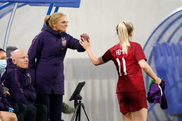 Sarina Wiegman, Head Coach of England interacts with Lauren Hemp of England the FIFA Women's World Cup 2023 Qualifier group D match between...