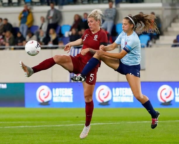 Millie Bright of England battles for possession with Laura Miller of Luxembourg during the FIFA Women's World Cup 2023 Qualifier group D match...