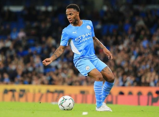 Raheem Sterling of Manchester City runs with the ball during the Carabao Cup Third Round match between Manchester City and Wycombe Wanderers F.C. At...