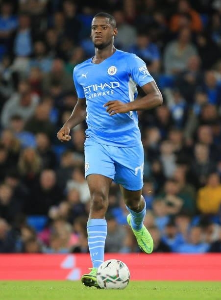Luke Mbete of Manchester City runs with the ball during the Carabao Cup Third Round match between Manchester City and Wycombe Wanderers F.C. At...