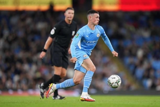 Phil Foden of Manchester City runs with the ball during the Carabao Cup Third Round match between Manchester City and Wycombe Wanderers F.C. At...