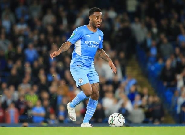 Raheem Sterling of Manchester City runs with the ball during the Carabao Cup Third Round match between Manchester City and Wycombe Wanderers F.C. At...