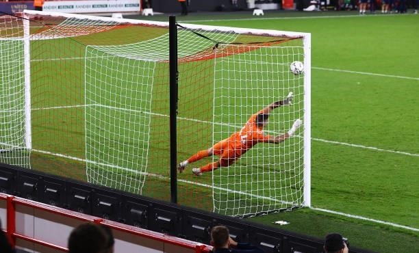 Fraser Forster of Southampton saves a penalty during the Carabao Cup Third Round match between Sheffield United and Southampton at Bramall Lane on...