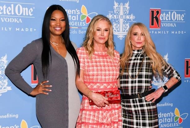 Garcelle Beauvais, Kathy Hilton and Kim Richards attend The Abbey's 16th annual Toy Drive for Children's Hospital LA at The Abbey Food & Bar on...