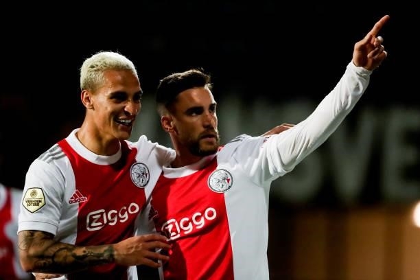 Anthony of Ajax and Nico Tagliafico of Ajax celebrate their sides fifth goal during the Dutch Eredivisie match between Fortuna Sittard and Ajax at...