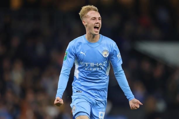 Cole Palmer of Manchester City celebrates after scoring their sixth goal during the Carabao Cup Third Round match between Manchester City and Wycombe...