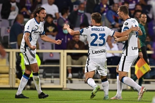 Darmian Matteo of FC Internazionale celebrates with teammates after scoring his team's first goal during the Serie A match between ACF Fiorentina v...