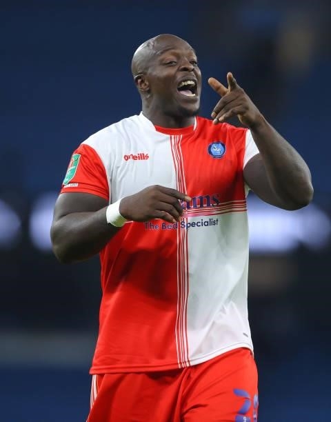 Adebayo Akinfenwa of Wycombe Wanderers F.C. Looks on after the Carabao Cup Third Round match between Manchester City and Wycombe Wanderers F.C. At...