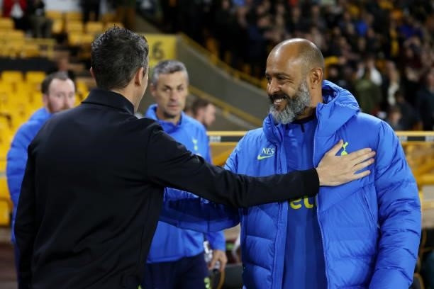 Bruno Lage, Manager of Wolverhampton Wanderers embraces Nuno Espirito Santo, Manager of Tottenham Hotspur prior to the Carabao Cup Third Round match...