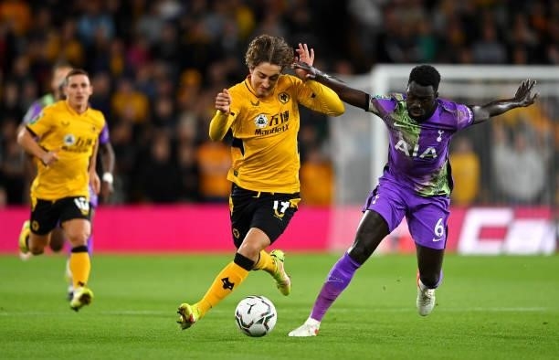 Fabio Silva of Wolverhampton Wanderers runs with the ball whilst under pressure from Davinson Sanchez of Tottenham Hotspur during the Carabao Cup...