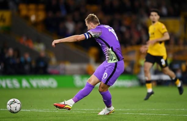Harry Kane of Tottenham Hotspur scores their side's second goal during the Carabao Cup Third Round match between Wolverhampton Wanderers and...