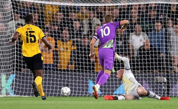 Harry Kane of Tottenham Hotspur scores their side's second goal past John Ruddy of Wolverhampton Wanderers during the Carabao Cup Third Round match...